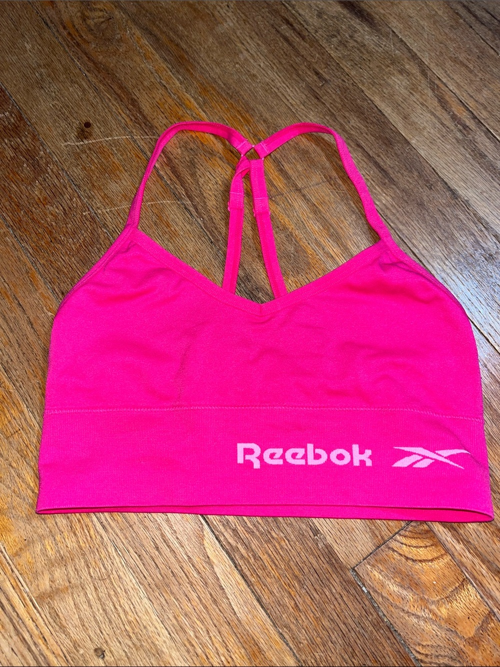 Pink Reebok racerback wide waist sports bra